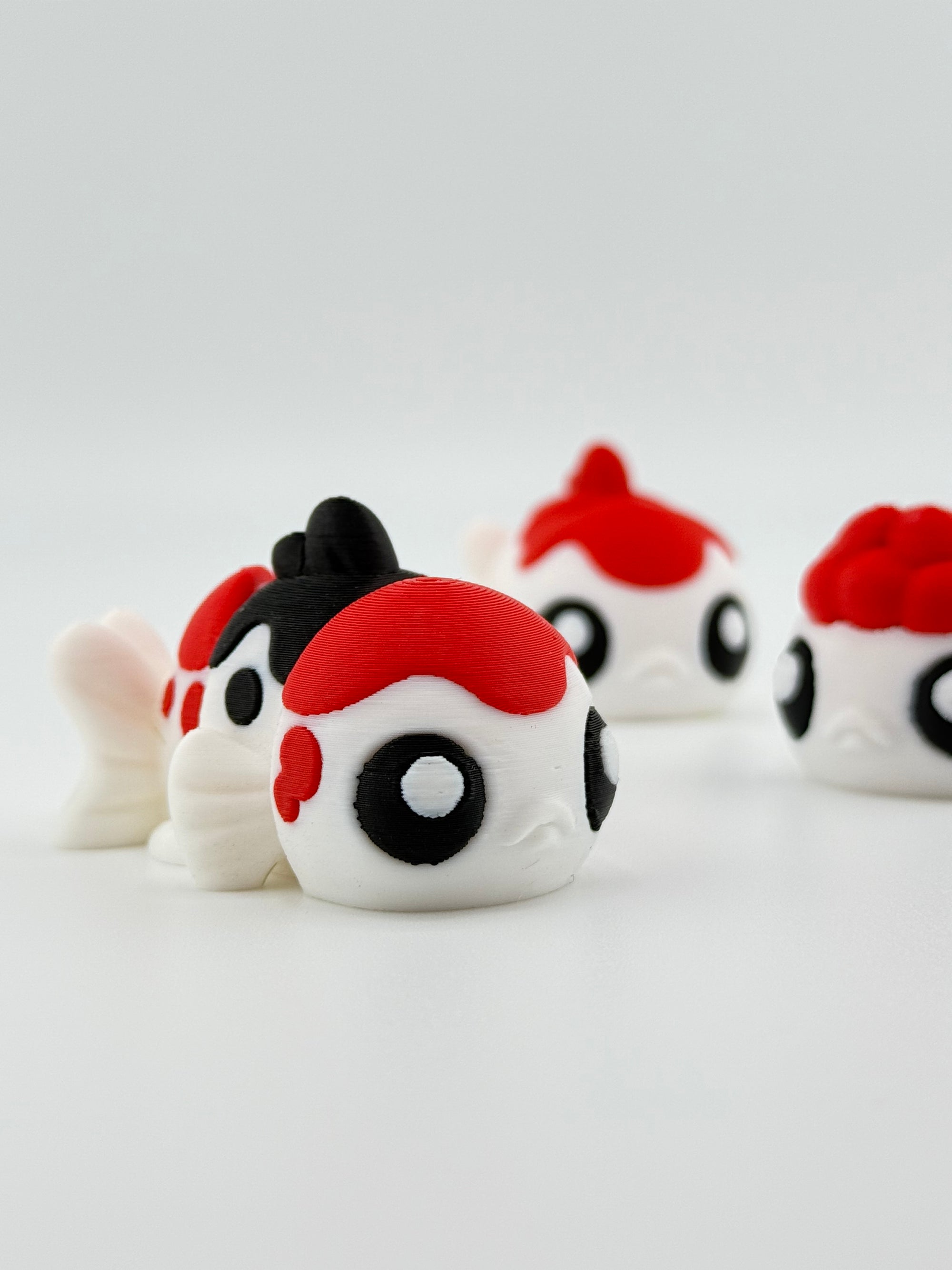 Red And Black Koi Fish