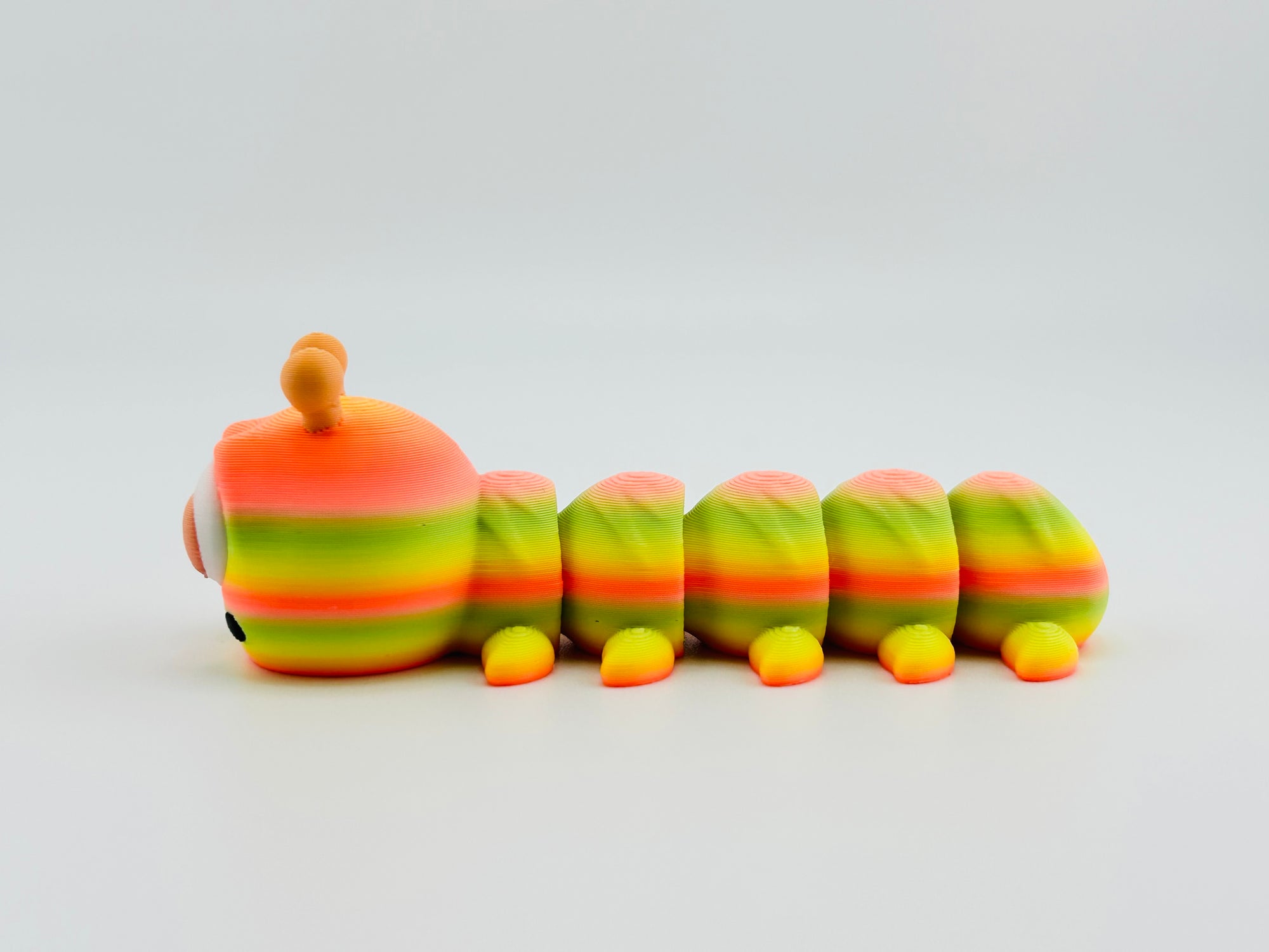 Caterpillar Gradient Tropical