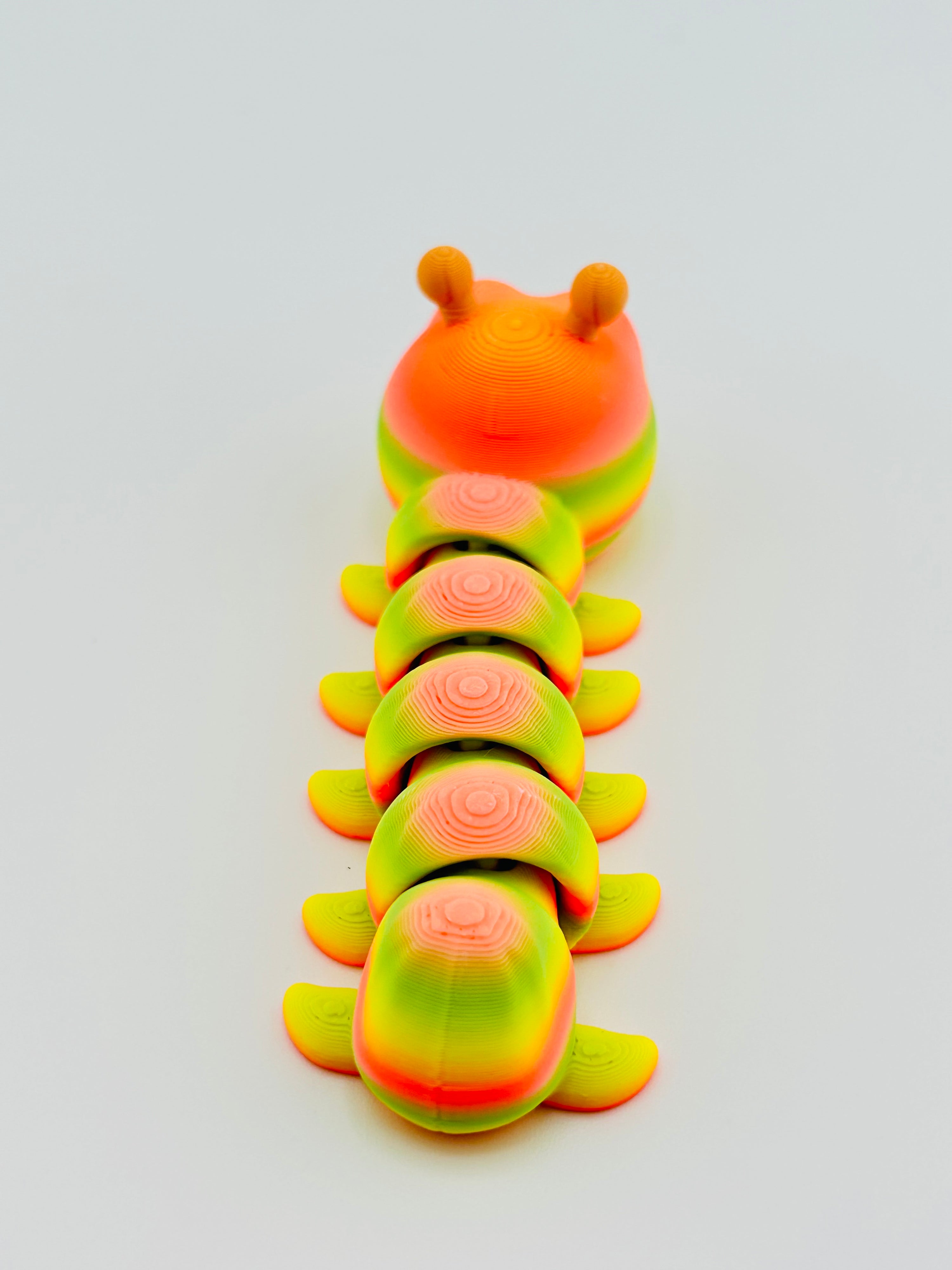 Caterpillar Gradient Tropical