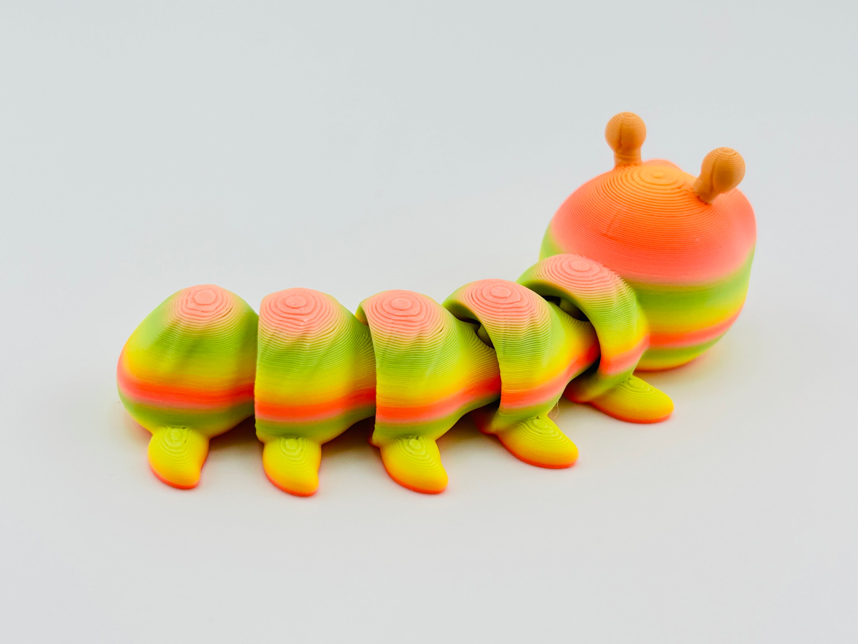 Caterpillar Gradient Tropical